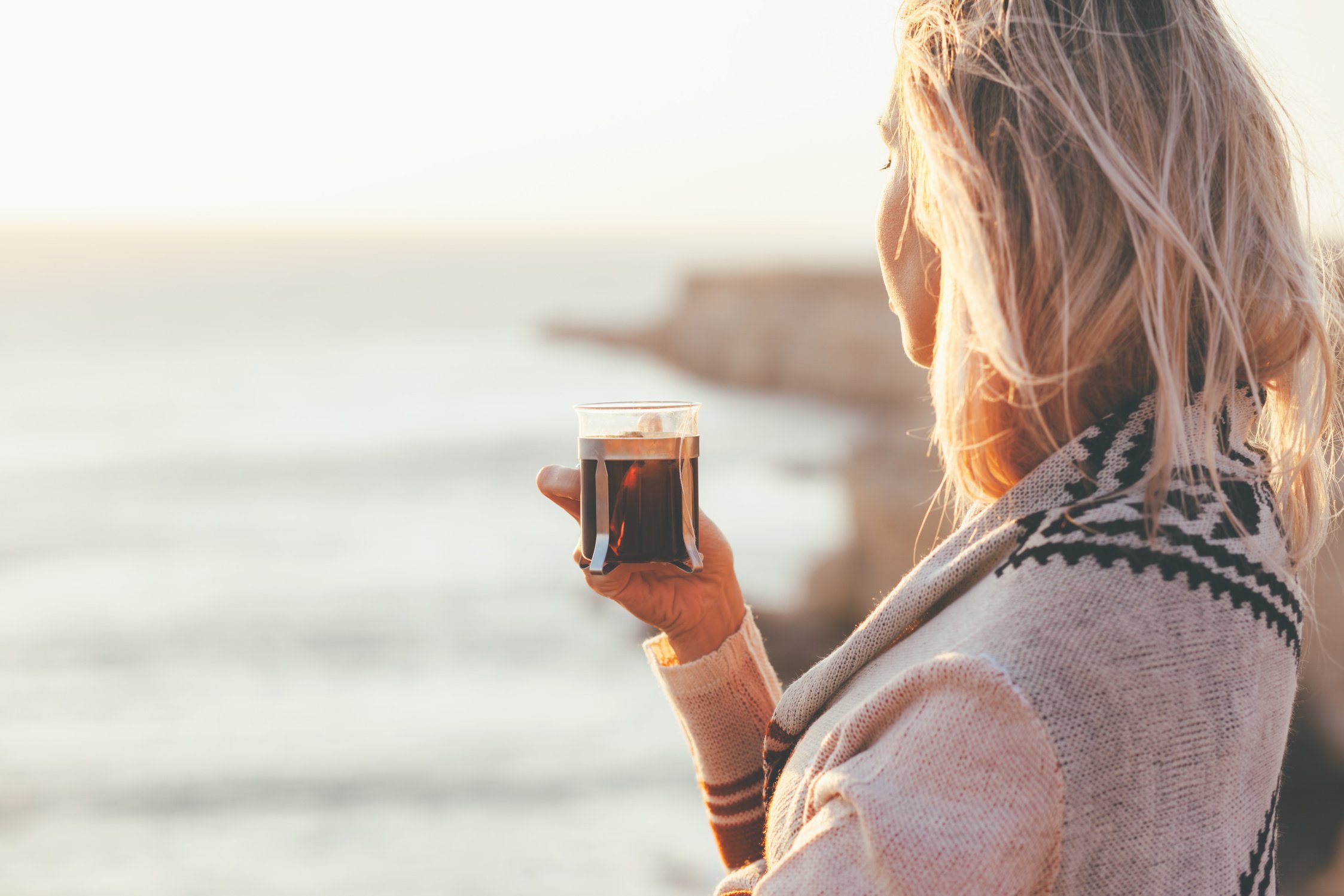 Woman Drinking Tea Outdoors